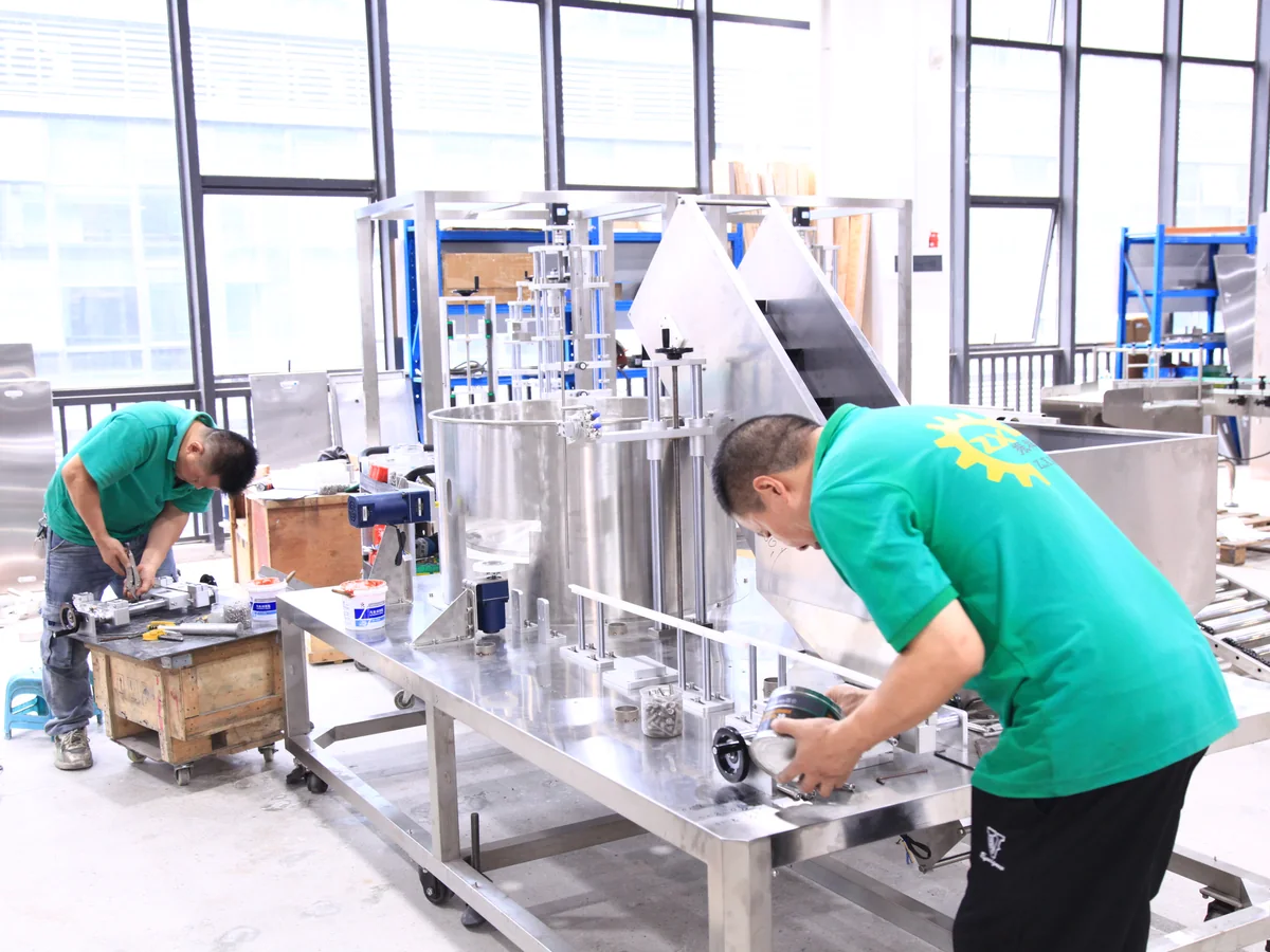 ZXSMART technicians assembling packaging equipment